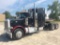 (TITLE) 1999 Peterbilt 379 tandem axle sleeper tractor; Cat. C-12 engine; Eaton Fuller 10-speed