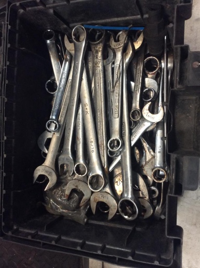 Plastic box & assorted wrenches.