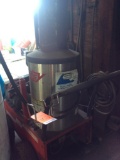 Husky oil fired high pressure hot water washer w/ hose reel; electric.