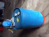 Partial drum of DEF w/ 55-gallon barrel & pump.