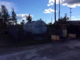 10,000-gallon single wall horizontal fuel tank w/ Gasboy electric pump & cyclone fence.
