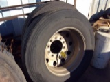 2 - 11R 24.5 tires on aluminum rims.