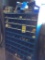 Blue wall parts organizer w/ fuses.