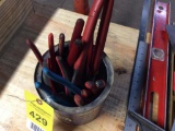 Can of assorted pliers.