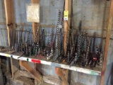 Lot of long auger drill bits.