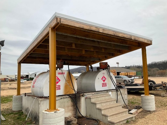 16' x 17" canopy over fuel tanks: I beam standards; wood frame; metal roof. (FUEL TANKS AND CONCRETE