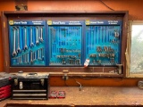 Lot of assorted tools, everything on wall & on bench.