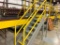 Steel steps over belt conveyors w/ platforms.