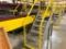 Steel steps over belt conveyors w/ platforms.