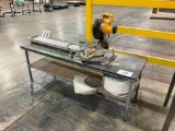 DeWalt DW703 mitre saw on table.