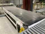 OSI 4' x 14' belt conveyor w/ electric drive w/ dead roll conveyor.