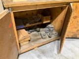 Wood cabinet w/ assorted misc. parts.