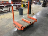 Orange 4 wheel factory cart.