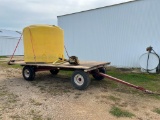 Raven 1600-gallon poly tank on 16' wood flat rack w/ Knowles 4-wheel wagon, Briggs & Stratton gas