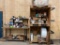 Shipping center w/ table on casters, shelving and related items.