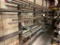 Steel material stock rack, 30 in x 14 ft, 6-tier, wall mount; no contents.