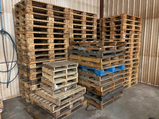 70 - wood pallets, 31 in x 47 in x 5 in; plus assorted pallets.
