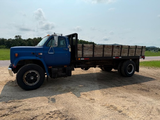 1984 GMC 7000 flatbed dump truck, single axle, 427 V8 gas engine, 5x2 trans, steel flatbed w/ hoist