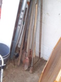 Posthole diggers, tapers, rakes and assorted garden tools