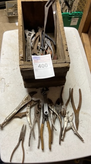 antique box with adjustable wrenches, vice grips, needle, nose, pliers