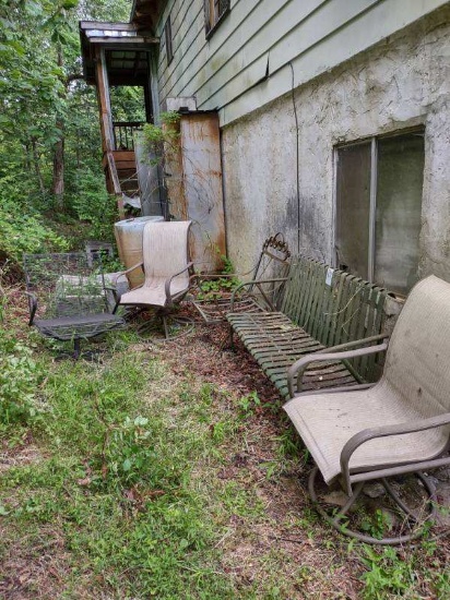 Antique metal swing and chairs