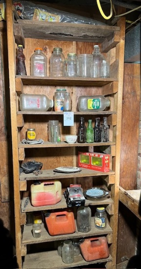 Contents on Shelf, Bottles, Fog Light and Gas cans
