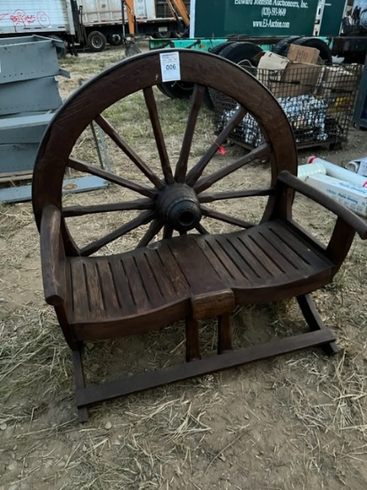 Rustic Bench With Wagon Wheel as Back