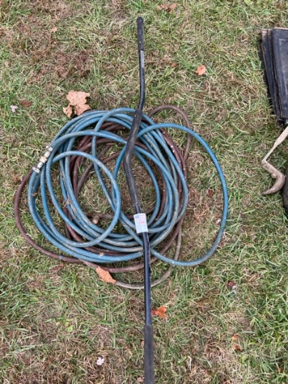 hose and weightlifting bar
