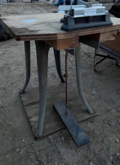 Table with foot control