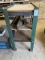 green work bench and contents steel bars etc