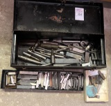 Toolbox with metal pieces