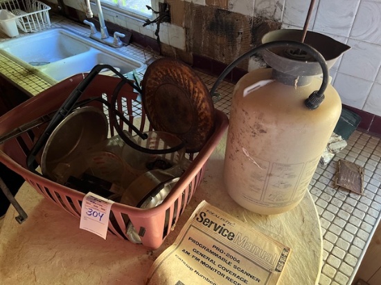 Basket of antiques and pump Sprayer