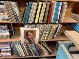 shelf vhs tapes and vinyl records