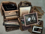 Pile of old frames and pictures