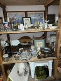 three shelves, stool, sink, pictures, dishes, glassware
