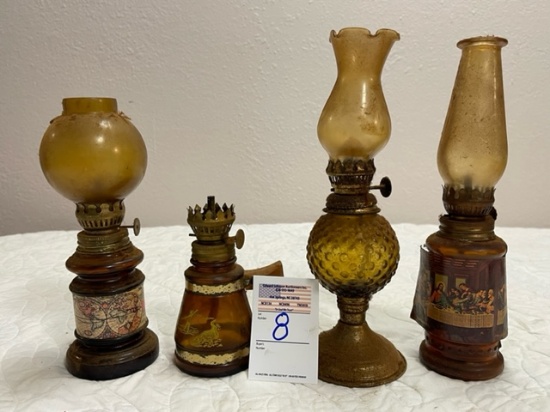 4 small oil lamps