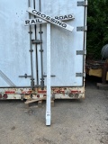 railroad crossing wood pole and sign
