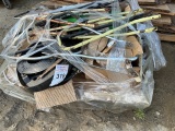 lawn boy handles and other types shelving on bottom of pallet