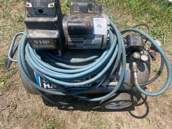 Campbell haussefield 5 hp 20 gallon compressor.