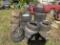 pile of lawn equipment tires and wheels
