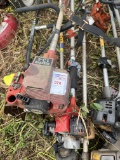 pile of weed eaters