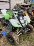 green four wheeler needs put together