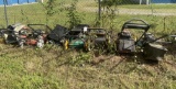 pile of push mowers