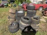 pile of lawn equipment tires and wheels