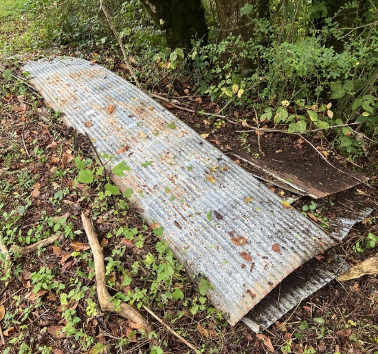 numerous pieces of old tin