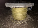 large spool of yellow lineman rope