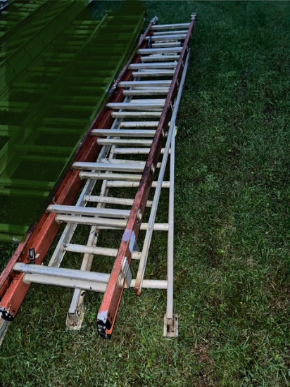 orange extention ladder and aluminum ladder