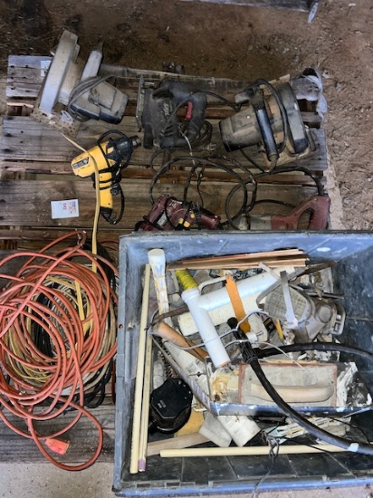 pallet of power tools and electric cords