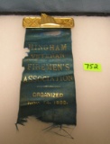 Antique fire department pin and ribbon set