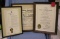 Three framed awards and proclamations